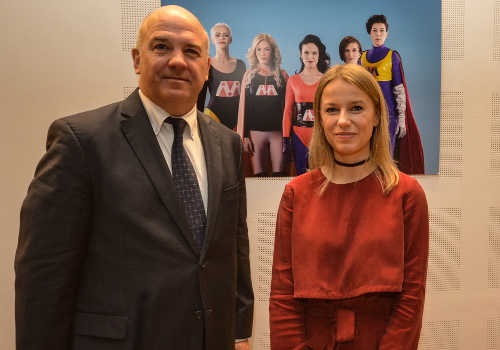 Commissioner Muižnieks with photo artist Neringa Rekašiūtė at the exhibition “Women – Superheroes”