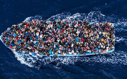 Asylum seekers on the Mediterranean sea, photo: Massimo Sestini
