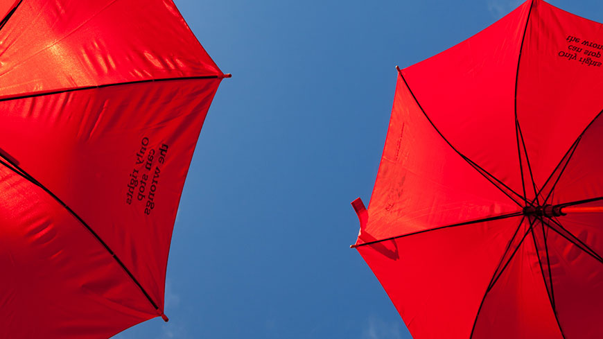 Umbrellas at a sex workers demonstration with the slogan: “Only rights can stop the wrongs”. ©Juno Mac