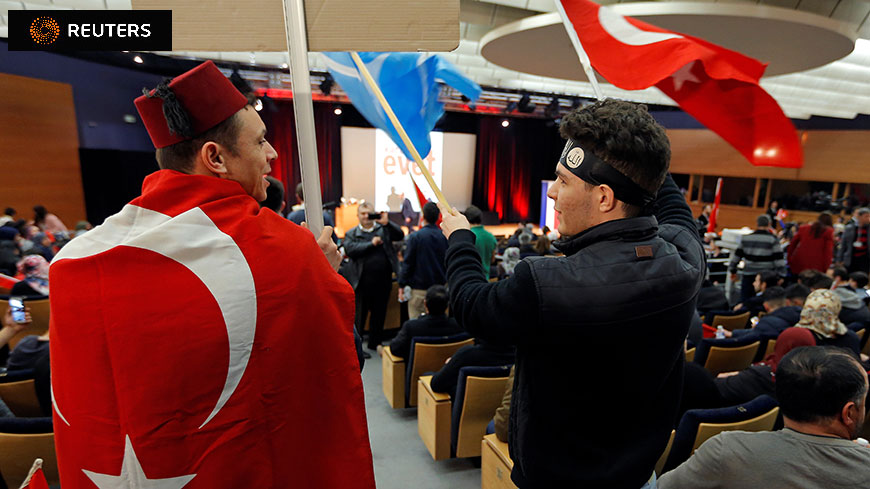 © 2017 REUTERS/Vincent Kessler www.reuters.com - Supporters wait before the start of Turkish Foreign Minister Çavuşoğlu's political rally on Turkey's upcoming referendum, in Metz (France)