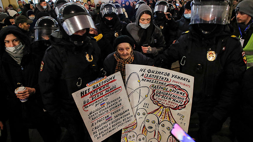 Yelena Osipova, an elderly artist and activist, is escorted to the police van during an anti-war protest, in Saint Petersburg, Russia on March 2, 2022. Credit: REUTERS/Stringer