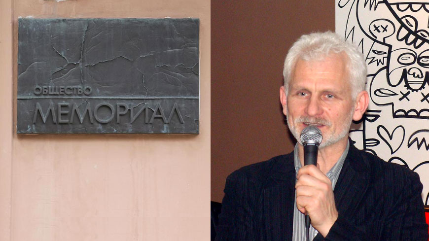 The plaque of Russian NGO Memorial in Moscow and a portrait of Belarusian human rights defender, Ales Bialiatski.