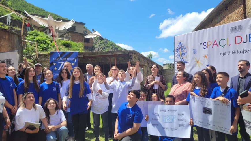 Students and teachers visit the former prison camp of Spaç