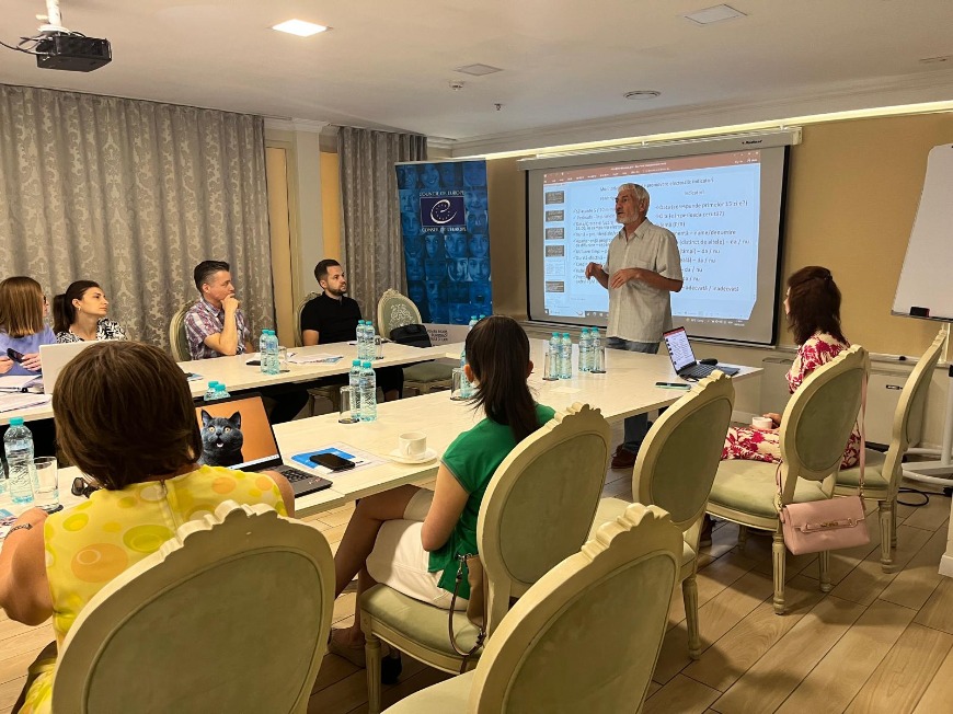 Ion Bunduchi (right) conducting a training session for members and employees of the Audiovisual Council (AC) of the Republic of Moldova